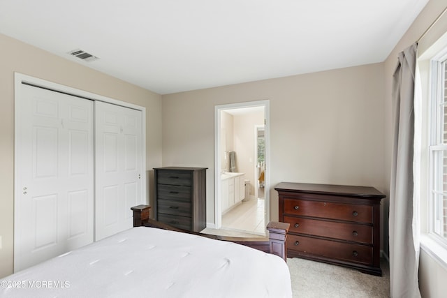 7 Topaz Dr, Jackson, NJ 08527 - bedroom featuring a closet, light colored carpet, multiple windows, and connected bathroom