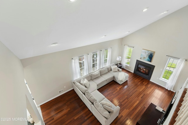 7 Topaz Dr, Jackson, NJ 08527 - living room with a glass covered fireplace, wood finished floors, high vaulted ceiling, and recessed lighting