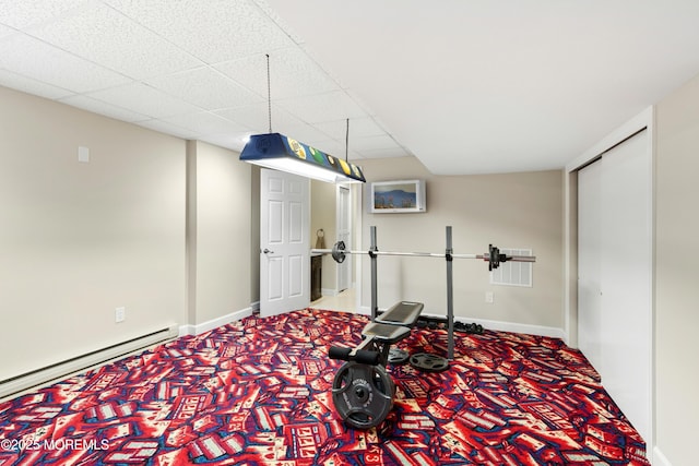 7 Topaz Dr, Jackson, NJ 08527 - workout room featuring carpet, a paneled ceiling, and a baseboard heating unit
