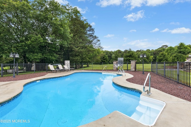 7 Topaz Dr, Jackson, NJ 08527 - view of swimming pool with view of scattered trees and a patio area