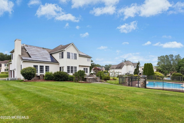 7 Topaz Dr, Jackson, NJ 08527 - back of house featuring a chimney