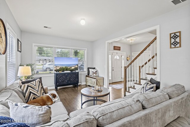 62 E 5th St, Howell, NJ 07731 - living room with hardwood / wood-style flooring, stairs, and baseboards