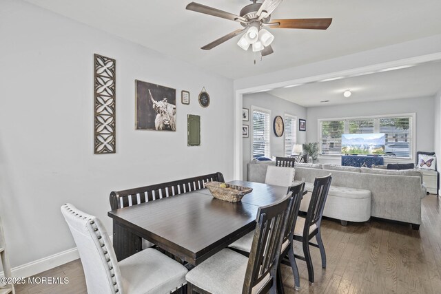 62 E 5th St, Howell, NJ 07731 - dining space with wood finished floors, a ceiling fan, and baseboards