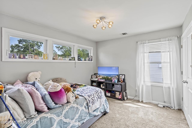 62 E 5th St, Howell, NJ 07731 - bedroom featuring carpet floors and a chandelier
