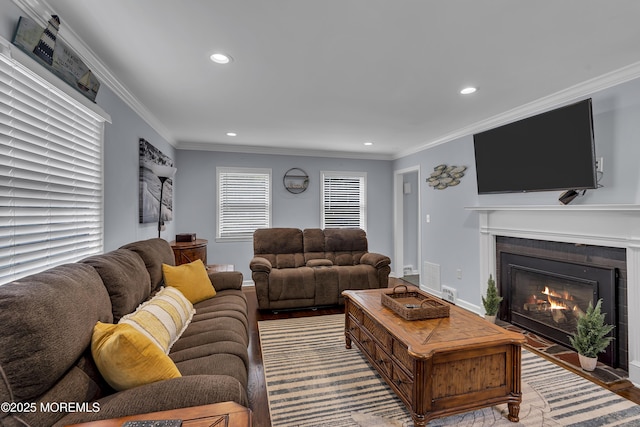 7 Elizabeth Pkwy, Eatontown, NJ 07724 - living area with recessed lighting, a fireplace with flush hearth, wood finished floors, crown molding, and baseboards