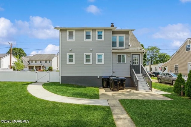 147 Joseph St, East Brunswick, NJ 08816 - rear view of house featuring a gate and a chimney