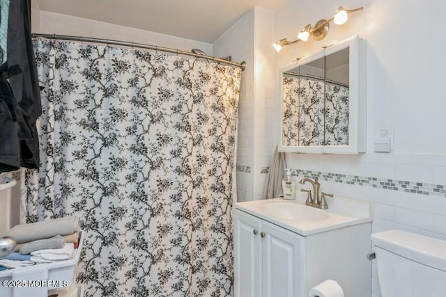 147 Joseph St, East Brunswick, NJ 08816 - full bathroom with vanity, curtained shower, and tile walls