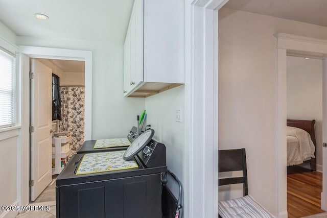 147 Joseph St, East Brunswick, NJ 08816 - kitchen featuring white cabinetry and light wood-style floors