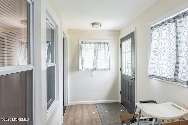 147 Joseph St, East Brunswick, NJ 08816 - foyer entrance featuring wood finished floors and baseboards