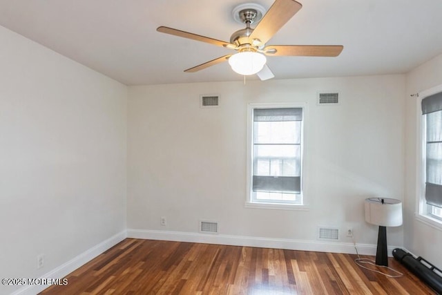 147 Joseph St, East Brunswick, NJ 08816 - spare room featuring plenty of natural light, wood finished floors, and a ceiling fan