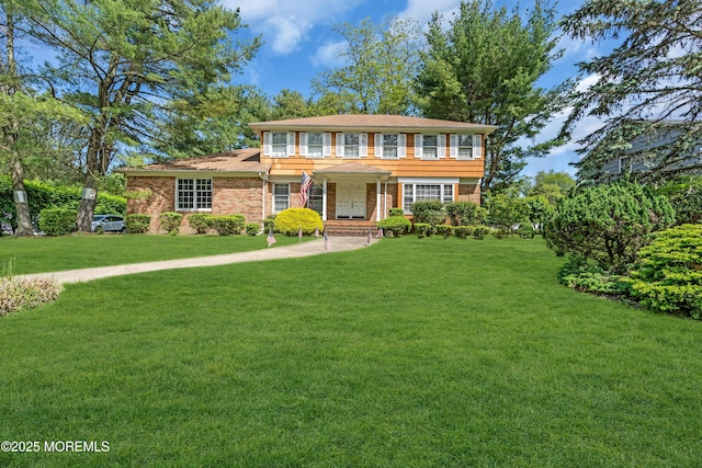 330 Green Grove Rd, Ocean Twp, NJ 07712 - view of front of property featuring a front yard and brick siding