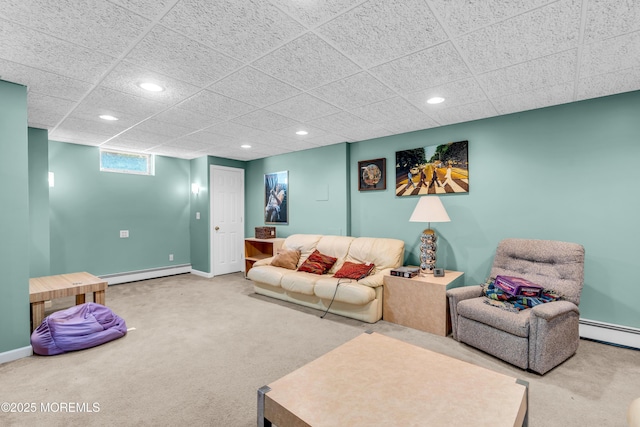 330 Green Grove Rd, Ocean Twp, NJ 07712 - carpeted living room with baseboard heating, recessed lighting, baseboards, and a paneled ceiling