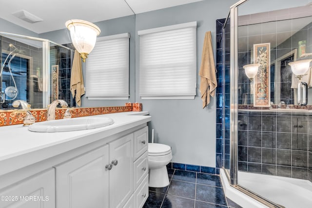 330 Green Grove Rd, Ocean Twp, NJ 07712 - bathroom with tile patterned floors, vanity, toilet, and a stall shower