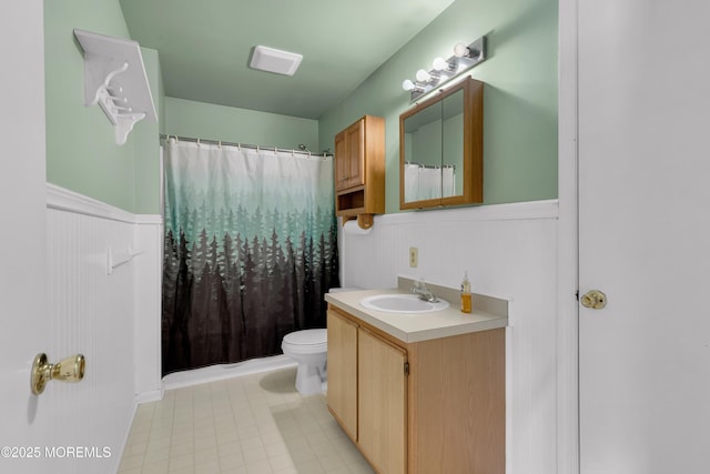11 Adler Cir, Lumberton, NJ 08048 - bathroom featuring a wainscoted wall, vanity, toilet, and a shower with shower curtain