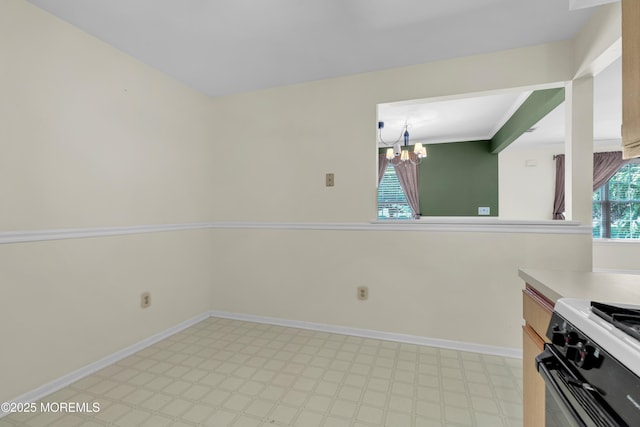 11 Adler Cir, Lumberton, NJ 08048 - kitchen with light flooring, a chandelier, light countertops, and baseboards