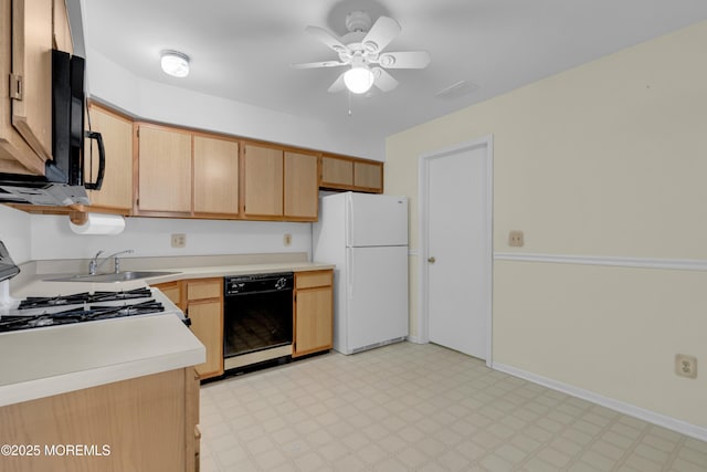 11 Adler Cir, Lumberton, NJ 08048 - kitchen featuring black appliances, light flooring, a sink, and light countertops