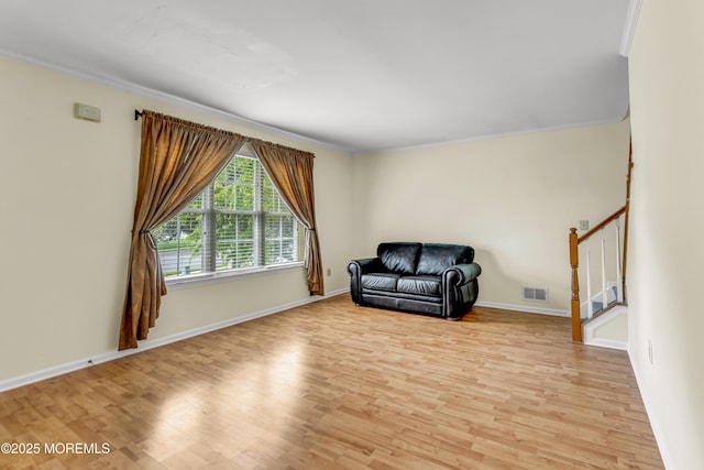 11 Adler Cir, Lumberton, NJ 08048 - unfurnished room with light wood-style flooring, stairway, baseboards, and crown molding