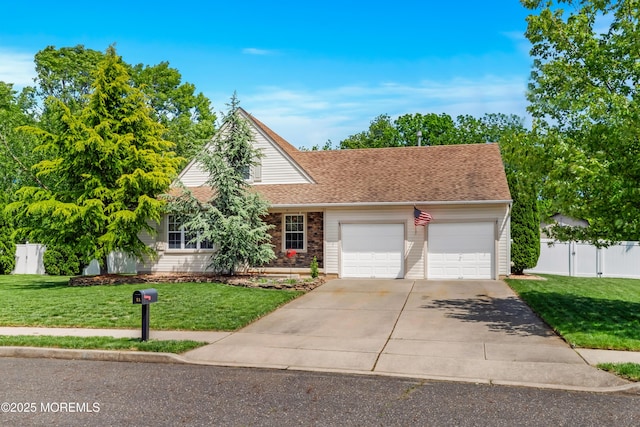 11 Adler Cir, Lumberton, NJ 08048 - view of front facade featuring a garage, driveway, and a shingled roof