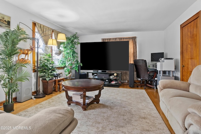 1020 Raritan Ave, Highland Park, NJ 08904 - living area with a desk and wood finished floors