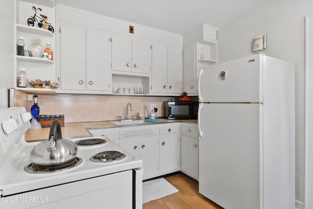 1020 Raritan Ave, Highland Park, NJ 08904 - kitchen featuring open shelves, white appliances, a sink, light countertops, and tasteful backsplash