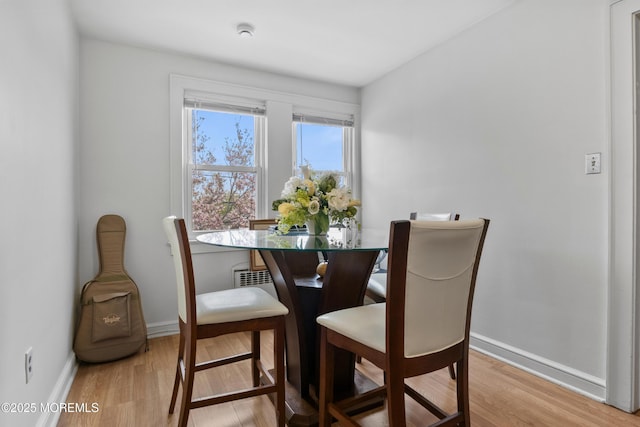 1020 Raritan Ave, Highland Park, NJ 08904 - dining area featuring wood finished floors and baseboards