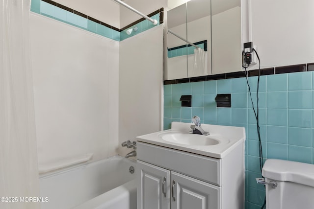 1020 Raritan Ave, Highland Park, NJ 08904 - full bath with vanity, shower / bath combo, tile walls, and toilet