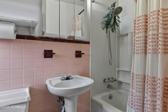 1020 Raritan Ave, Highland Park, NJ 08904 - bathroom with shower / bathtub combination with curtain, tile walls, and toilet