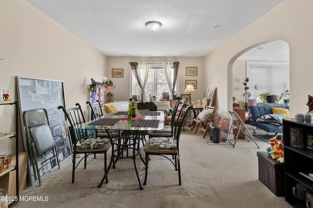 1020 Raritan Ave, Highland Park, NJ 08904 - carpeted dining area featuring arched walkways