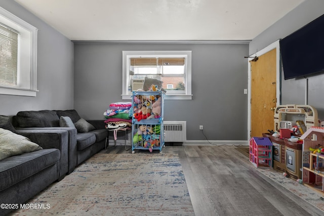 1020 Raritan Ave, Highland Park, NJ 08904 - living area with radiator and wood finished floors