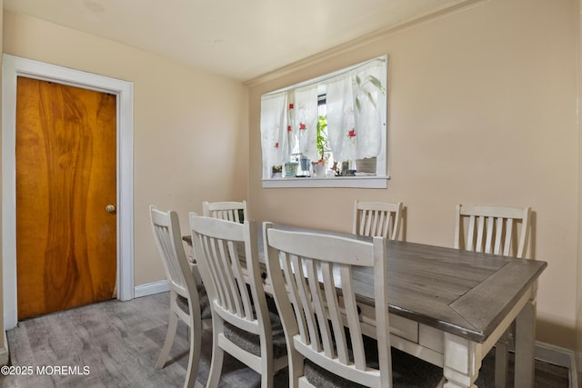 1020 Raritan Ave, Highland Park, NJ 08904 - dining room featuring wood finished floors and baseboards