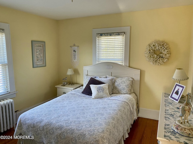 25 Terrace Ave, Toms River, NJ 08753 - bedroom with radiator, dark wood finished floors, and baseboards