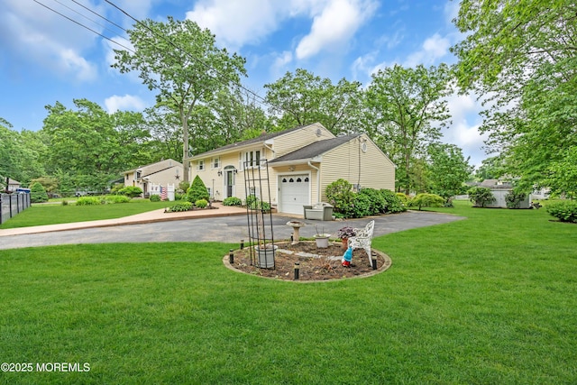 50 Darien Rd, Howell, NJ 07731 - view of front facade featuring an attached garage, asphalt driveway, and a front yard