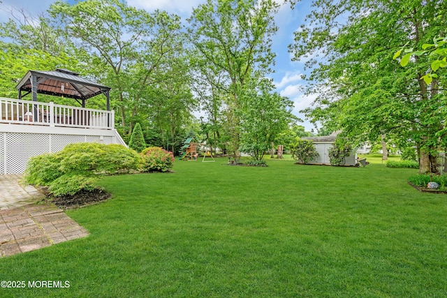 50 Darien Rd, Howell, NJ 07731 - view of green lawn featuring a playground, a gazebo, and a deck