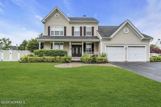 43 Saint Johns Dr, Freehold, NJ 07728 - view of front of home with driveway, a garage, covered porch, a gate, and a chimney