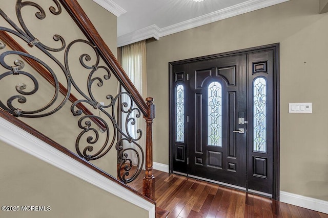 43 Saint Johns Dr, Freehold, NJ 07728 - entrance foyer featuring baseboards, dark wood finished floors, and crown molding