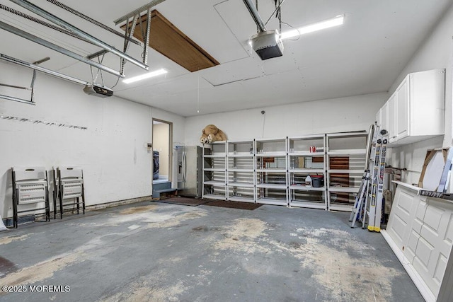 43 Saint Johns Dr, Freehold, NJ 07728 - garage featuring a garage door opener