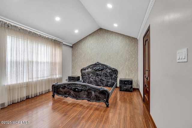 43 Saint Johns Dr, Freehold, NJ 07728 - living area featuring wood finished floors, vaulted ceiling, and recessed lighting