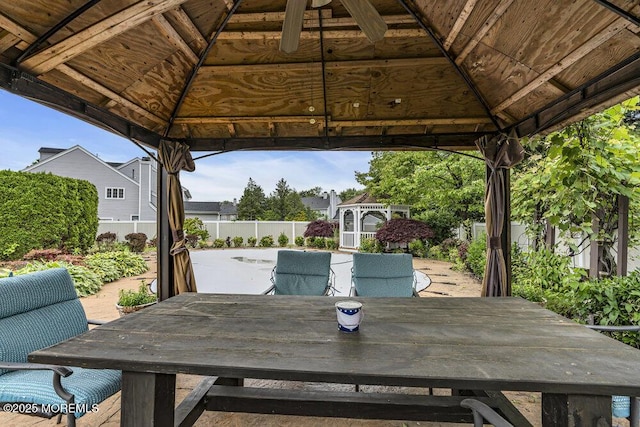 43 Saint Johns Dr, Freehold, NJ 07728 - view of patio / terrace featuring a gazebo, outdoor dining area, and an outbuilding