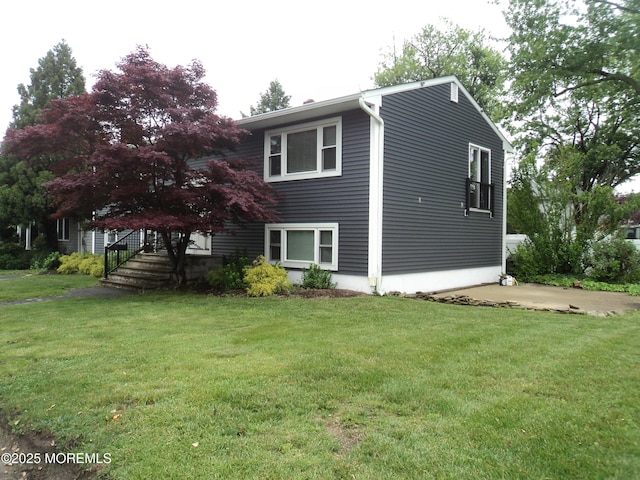 127 Hulick St, Long Branch, NJ 07740 - view of front facade featuring a front yard