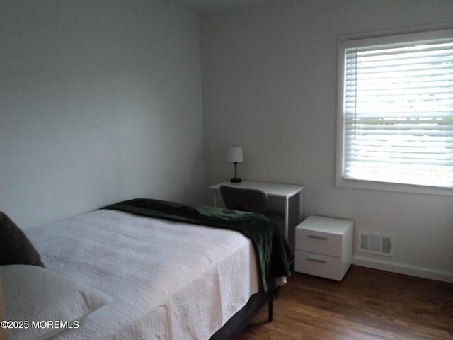 127 Hulick St, Long Branch, NJ 07740 - bedroom with wood finished floors and baseboards