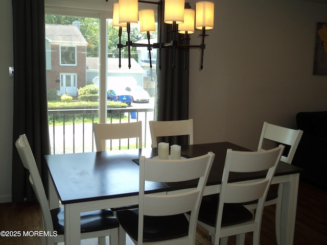 127 Hulick St, Long Branch, NJ 07740 - dining area with wood finished floors and a chandelier