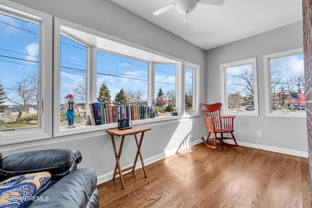 1204 River Rd, Belmar, NJ 07719 - sitting room with wood finished floors, baseboards, and a ceiling fan