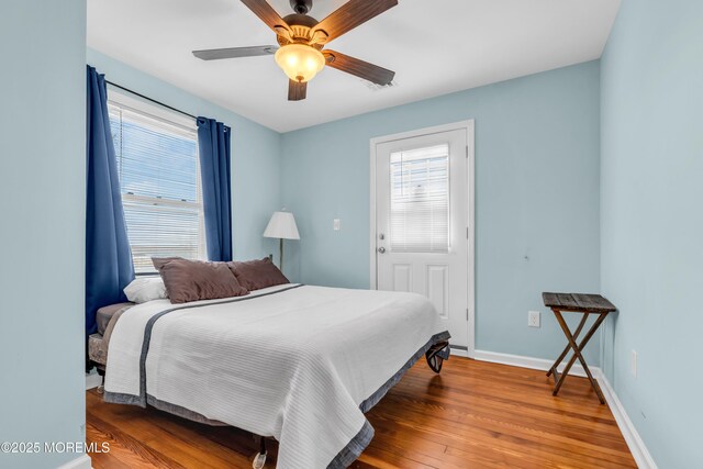 1204 River Rd, Belmar, NJ 07719 - bedroom with wood finished floors, baseboards, and a ceiling fan