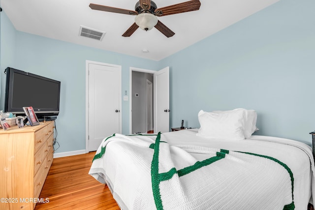 1204 River Rd, Belmar, NJ 07719 - bedroom with light wood-style floors, baseboards, and ceiling fan