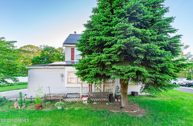 830 Atlantic City Blvd, Bayville, NJ 08721 - view of front of property with solar panels and a front lawn