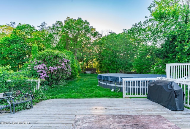 830 Atlantic City Blvd, Bayville, NJ 08721 - wooden terrace featuring a covered pool, grilling area, a lawn, and view of scattered trees