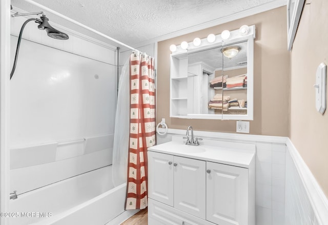 830 Atlantic City Blvd, Bayville, NJ 08721 - full bathroom with a textured ceiling, vanity, shower / tub combo with curtain, a wainscoted wall, and wood finished floors
