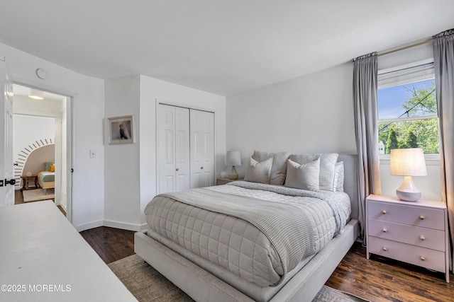 17 Maplewood Dr, Middletown, NJ 07748 - bedroom with dark wood finished floors, a closet, and baseboards