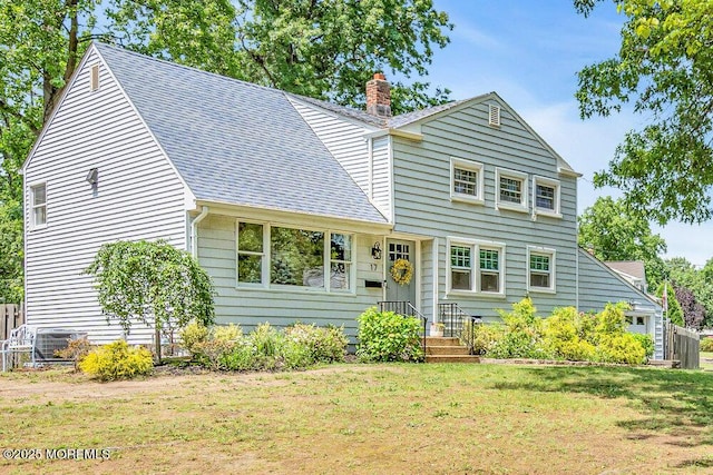 17 Maplewood Dr, Middletown, NJ 07748 - traditional-style home featuring roof with shingles and a chimney