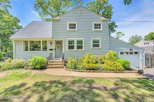 17 Maplewood Dr, Middletown, NJ 07748 - traditional-style home with a garage, a front yard, and roof with shingles